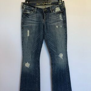 Ruehl 925 distressed bootcut jeans